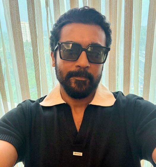 Suriya looked dashing wearing a black RWDY polo tee